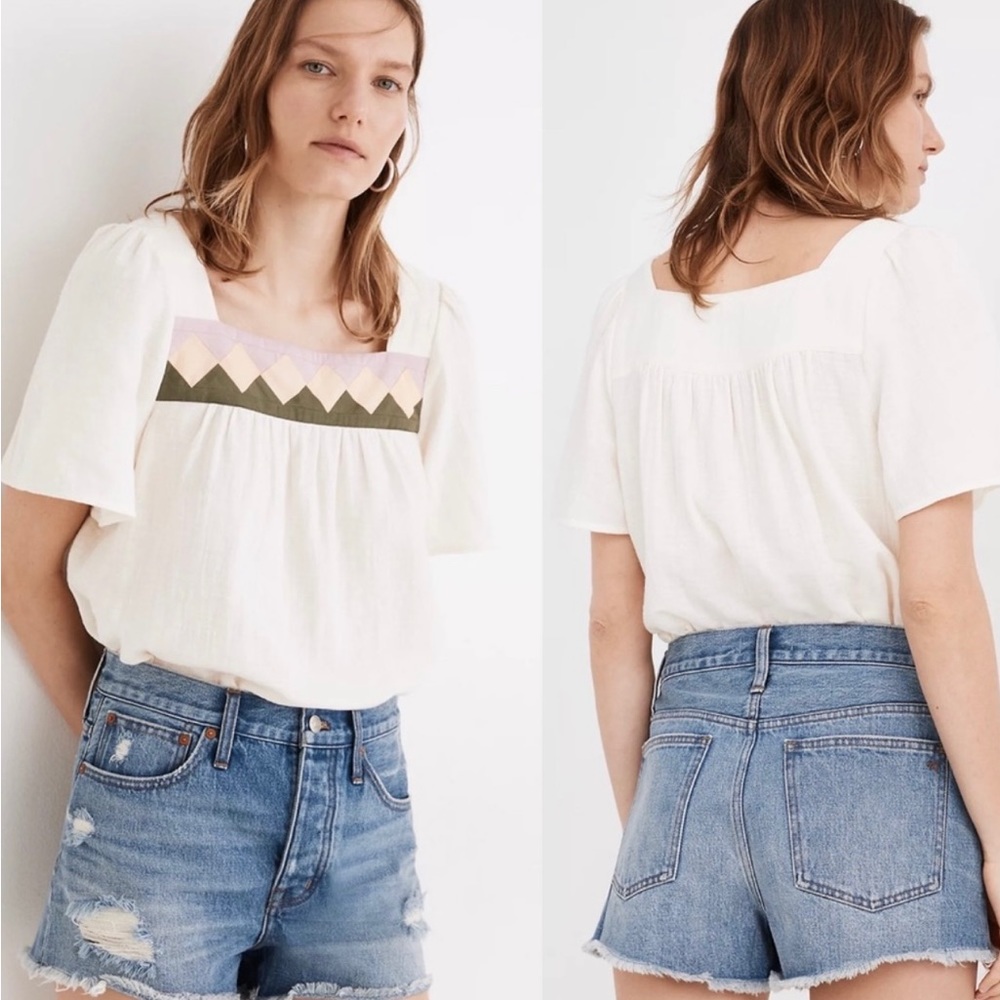 Madewell distressed relax denim blue shorts.